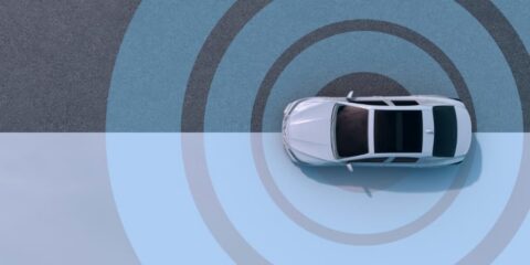Driverless automatic car on blue and black background